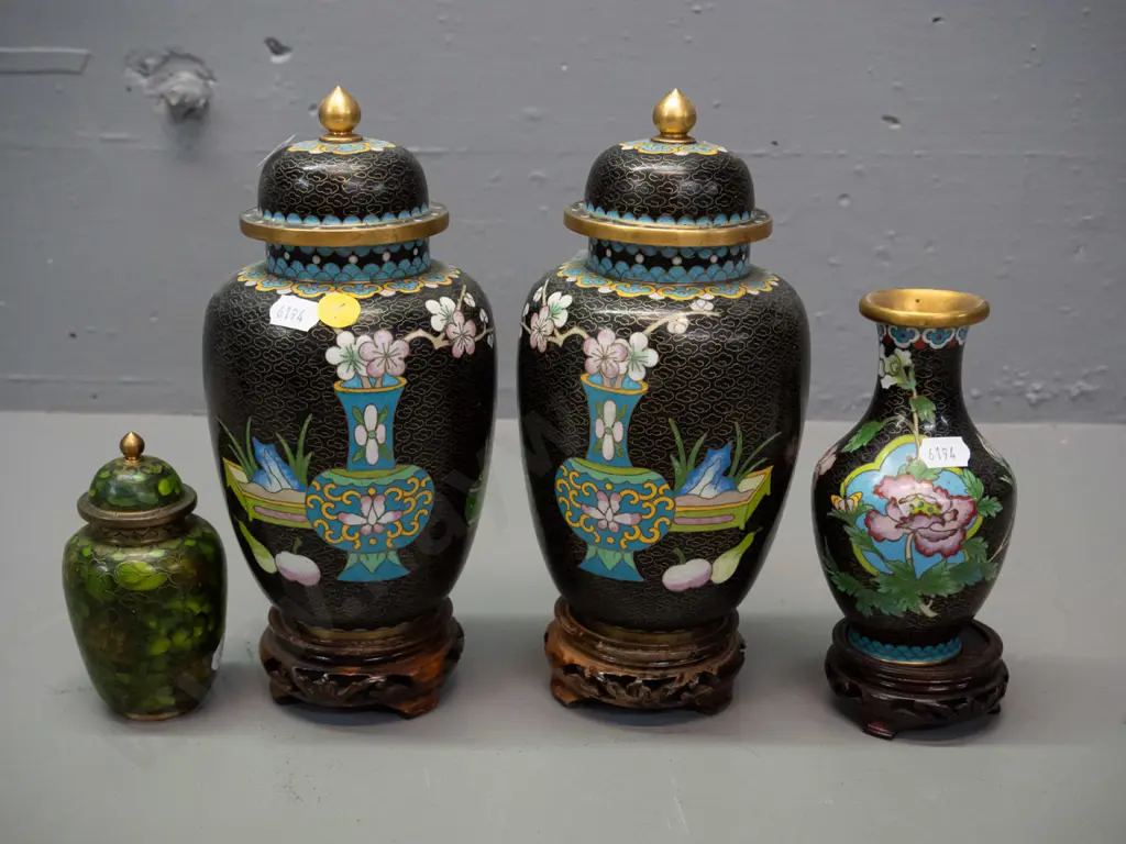 Chinese cloisonne ware - pair of black lidded temple jars on carved timber stands, small vase on stand, and small green Image 1++