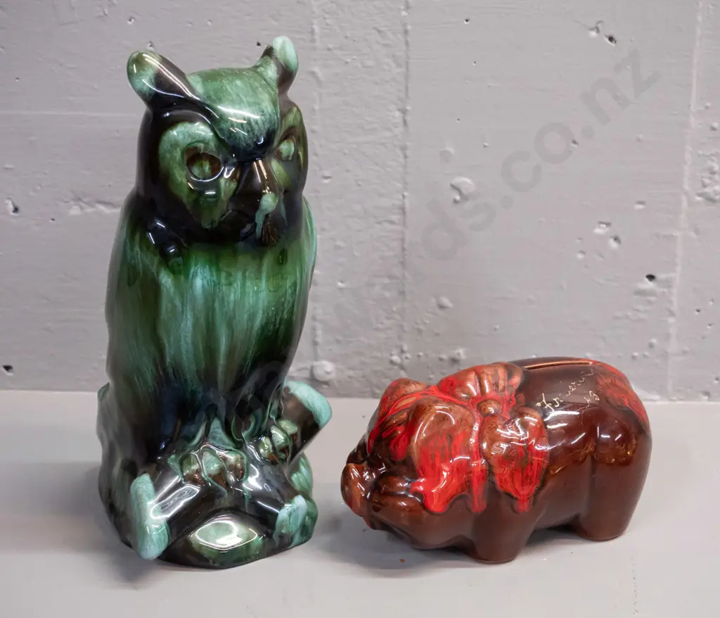 2 pieces of Blue Mountain pottery - orange trickle glaze piggy bank marked Fredericton N.B. and a teal glaze owl H-250. Image 1++