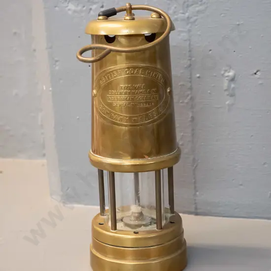 reproduction brass miner's lamp - marked British Coal Mining Co. Wales H-210