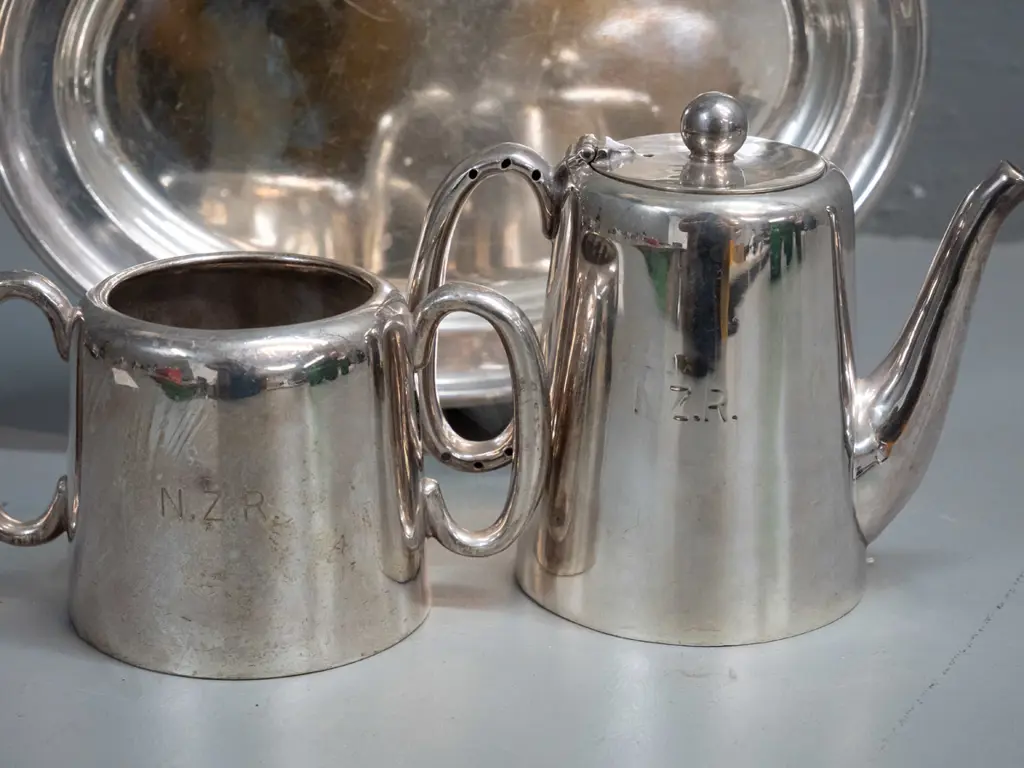 silver plated serving ware with impressed NZR lettering - lidded jug, sugar bowl and serving tray L-260 W-190 Image 1++