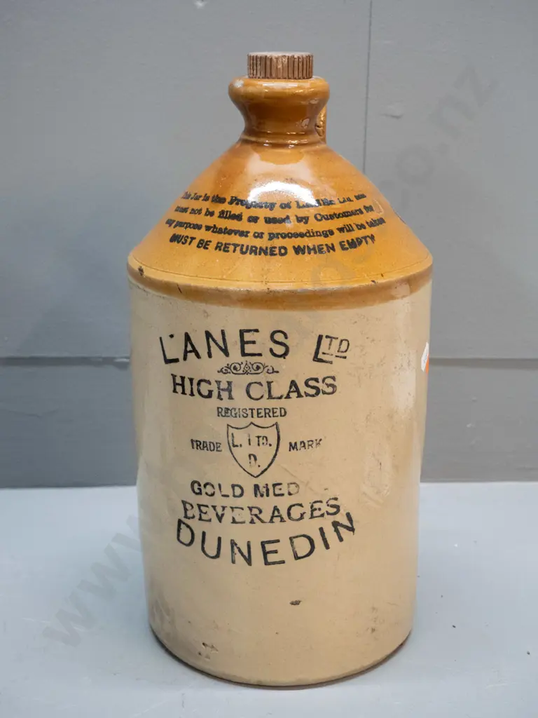 narrow mouth crock marked Lane's Gold Medal Beverages Dunedin, No. 5, with threaded timber stopper marked Lane's - big Image 1++
