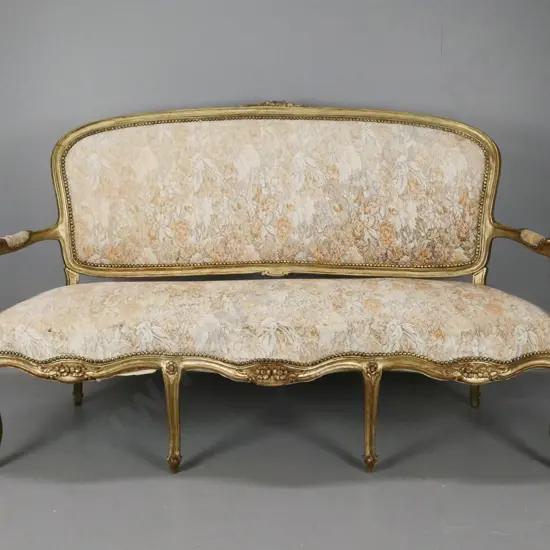 19th century French cab-leg open-arm sofa with gilt finish, floral brocade fabric, gilded studding - fading and