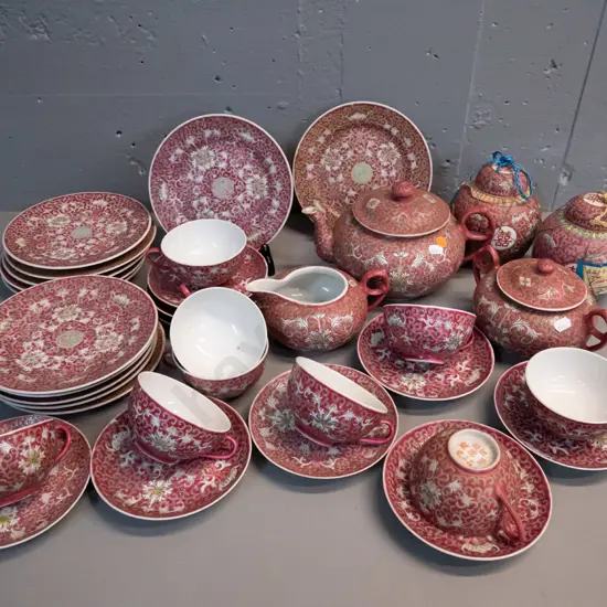 large collection of Cantonese plum colour tea ware and 2 ginger jars with original labels. 9 cups, 10 saucers,