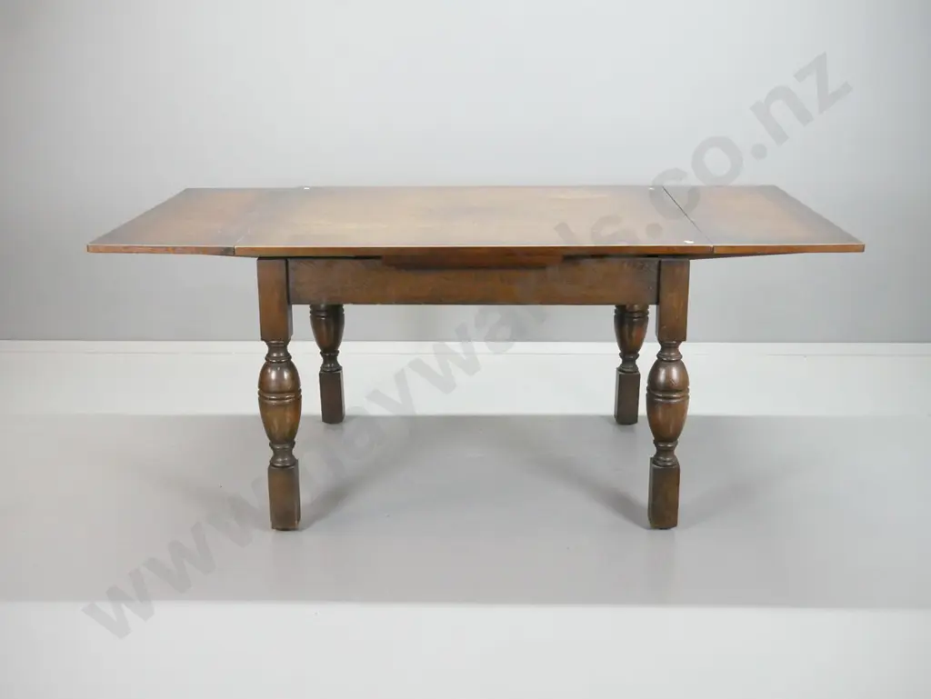 vintage oak draw-leaf dining table with bolster turned legs, 4 chairs with pop out seats, some movement in chair backs, Image 1++