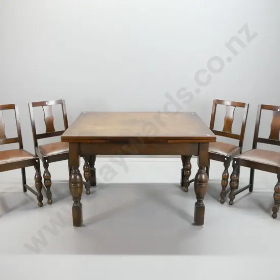 vintage oak draw-leaf dining table with bolster turned legs, 4 chairs with pop out seats, some movement in chair backs,
