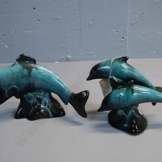2 Blue Mountain pottery figures with original hang tags and labels - double dolphins H-140 L-190 (small chip) and a