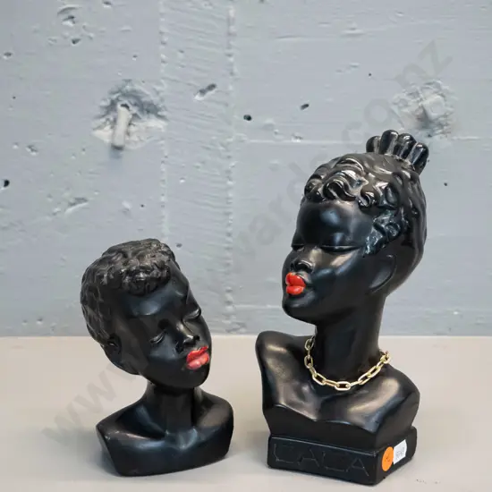 2 small black painted porcelain or plaster busts - larger H-200 marked "Zaza" on front and Pagliai on back, both have