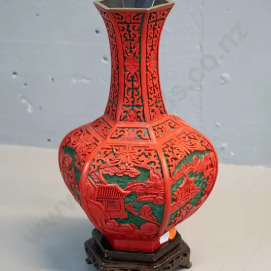 Chinese cinnabar style relief pattern hexagonal profile vase with carved timber stand H-300