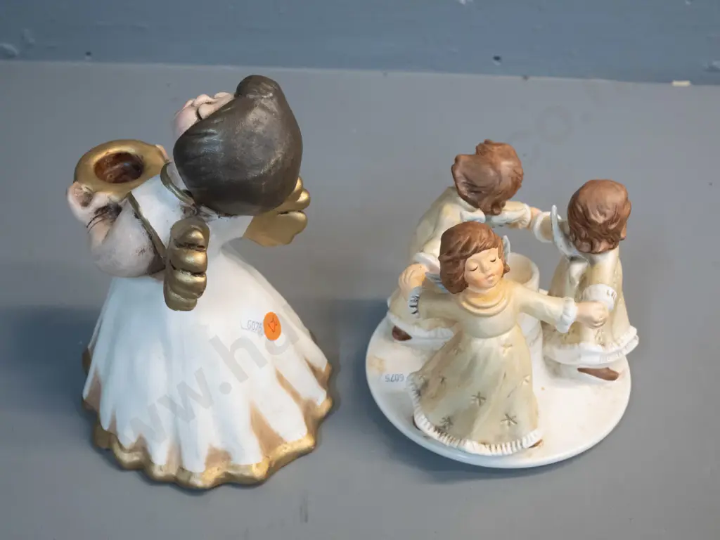 Goebel figural candle holder of 3 singing angels marked HE52 / 1971 and a single angel marked Bozner Engel Thun H190 Image 1++