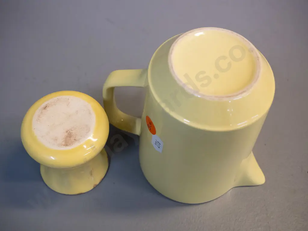 2 Crown Lynn yellow glaze items - small vase with brown interior and a milk jug with white interior with faint Made in Image 1++