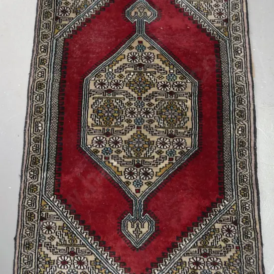 Iranian "Mahalat" style hand-knotted wool small floor rug or prayer mat - reds and multi colour, staining and missing