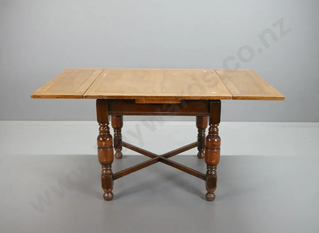 vintage oak draw-leaf table with panelled top, bolster turned legs on x-frame stretcher base, w/4 slat-back chairs, pop Image 1++