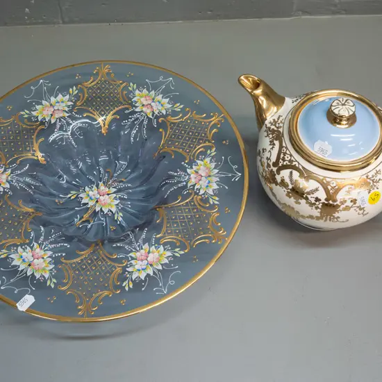 Gibsons hand painted gilt and cream glaze teapot and an Italian Venetian style hand painted floral and gilt shallow blue