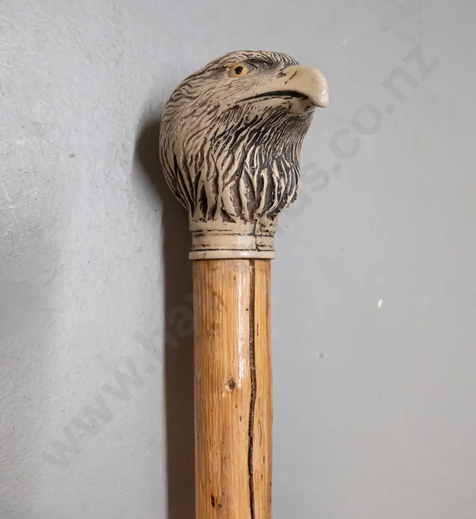timber walking stick with (composite?) faux carved bone eagle head knob & brass tip - has split to timber L-910 Image 1++