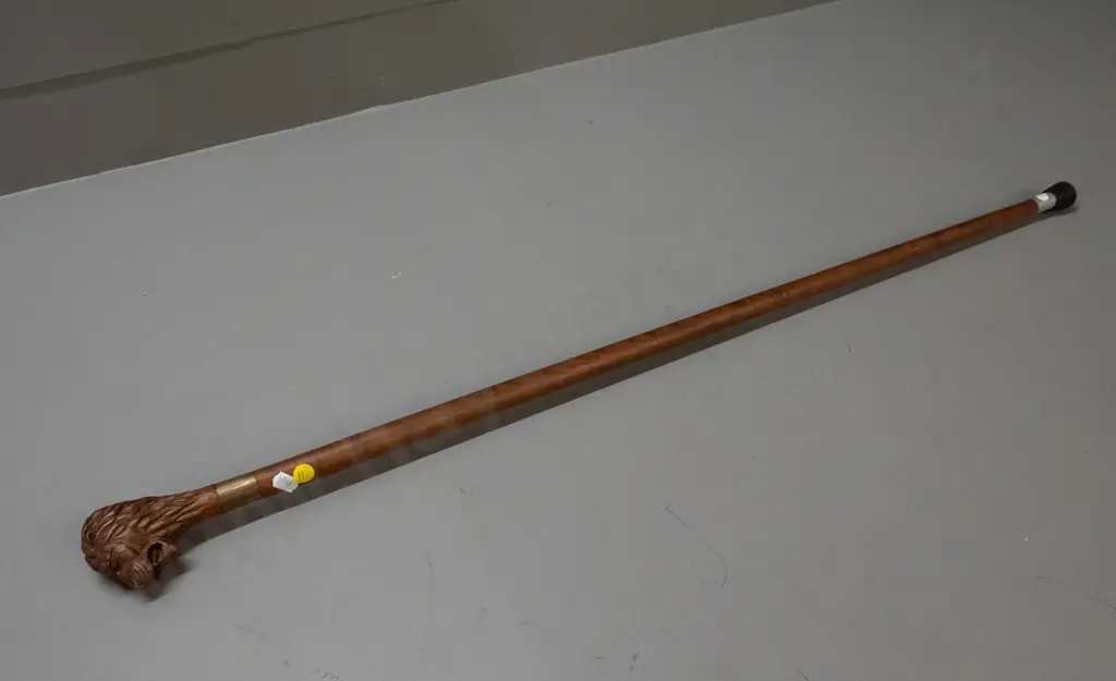 timber walking stick with carved lion head handle, beaten metal band, rubber tip L-885 Image 1++