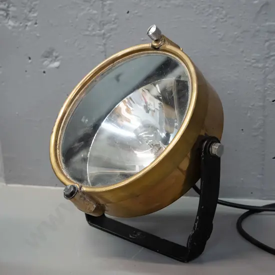 brass cased spotlight with mirrored interior, black painted metal mounting bracket, no plug D-180