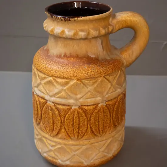 German pottery handled vase - has small casting fault on side H-250