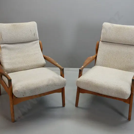 pair of mid-century Don mahogany armchairs with concorde-shaped arms - some fading and water staining to timber, wear