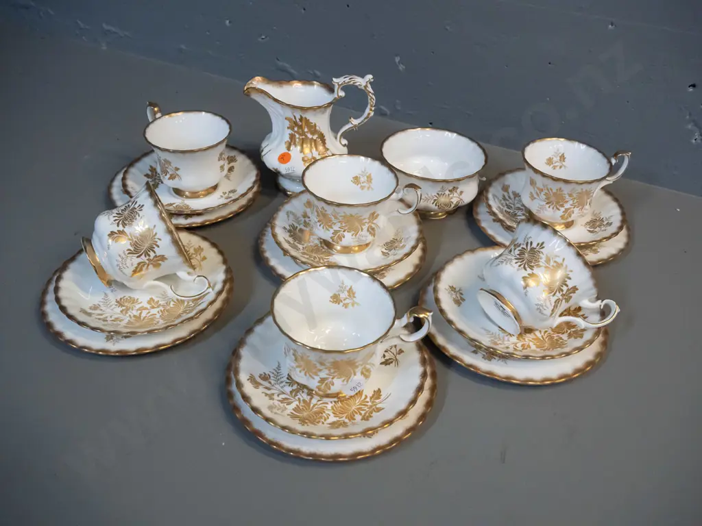 gilt and cream teaware - 6 Royal Albert Golden Glory trios plus a sugar bowl plus a Hammersley milk jug Image 1++