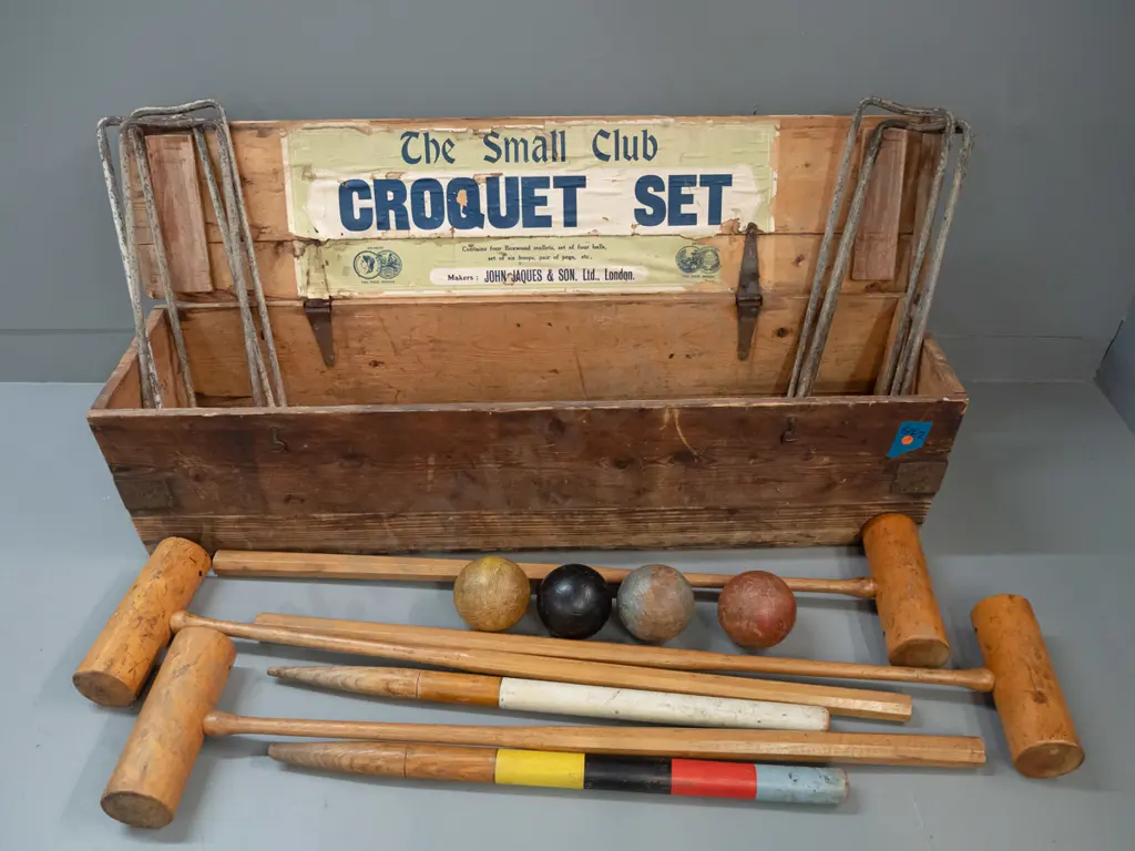vintage croquet set in pine case with metal hinges and handles with 4 boxwood & hickory mallets, 4 balls, 6 iron hoops Image 1++