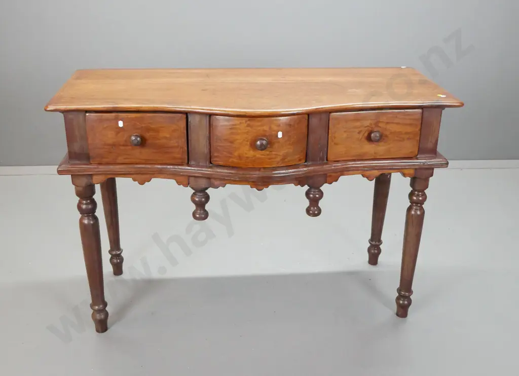 Asian teak serpentine fronted side or hall table with 3 drawers w/turned knobs, turned drop finials, on turned legs - Image 1++