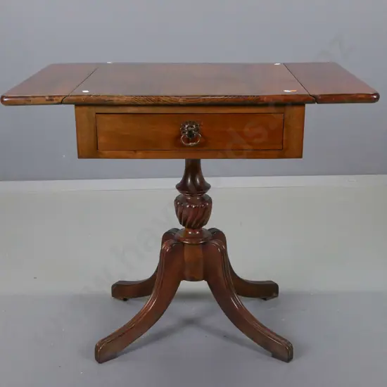 rimu and beech sofa table with 2 flaps & drawer, turned column base on 4 sweeping legs. Top surface has chips. H-660