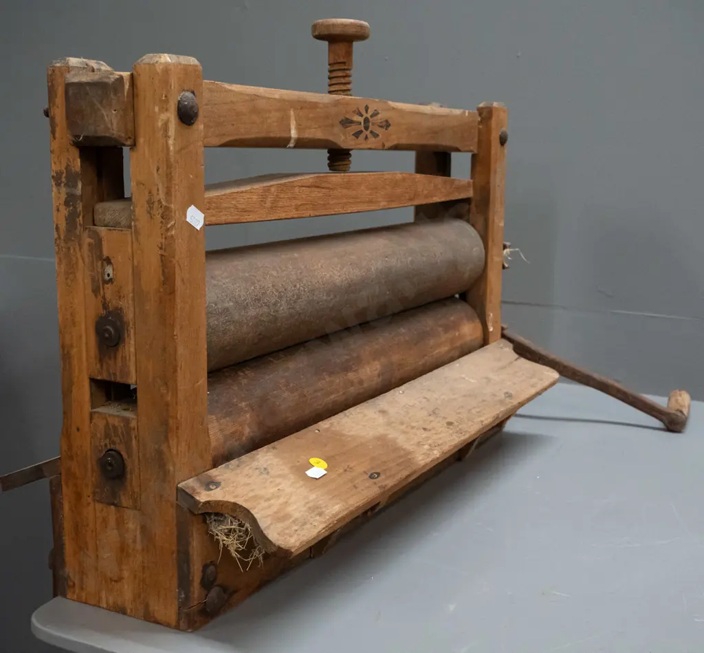 vintage mangle with timber frame and rollers, cast iron handle and fixings, screw bench bracket mounts. Image 1++