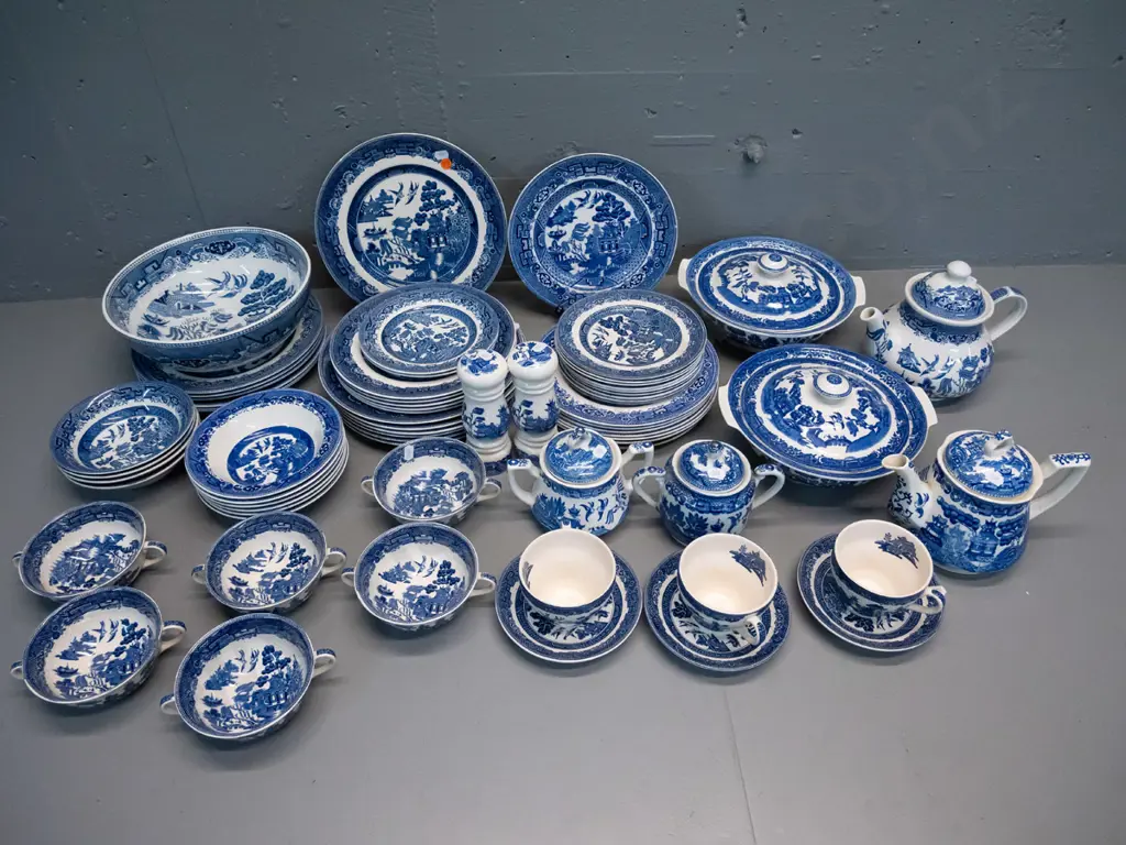 large assortment of blue and white tableware, almost all willow, different ages and makers, 6 soups, 2 teapots, 2 lidded Image 1++