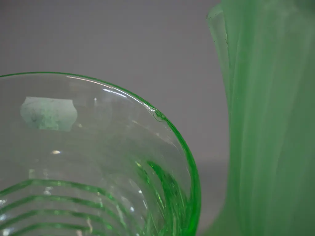 2 pieces of green uranium glass - frosted footed vase with faint glow, H-145 and a water tumbler with small chip to rim Image 1++
