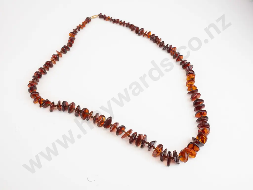strand of amber graduated 15mm to 7mm baroque button beads rolled gold catch 80cm Image 1++