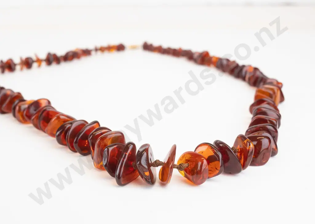 strand of amber graduated 15mm to 7mm baroque button beads rolled gold catch 80cm Image 1++