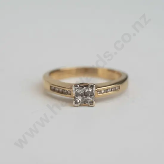 9ct gold diamond ring 4 meter locked diamonds in centre 4 claw coronet 3.5gm, 10 shoulder diamonds