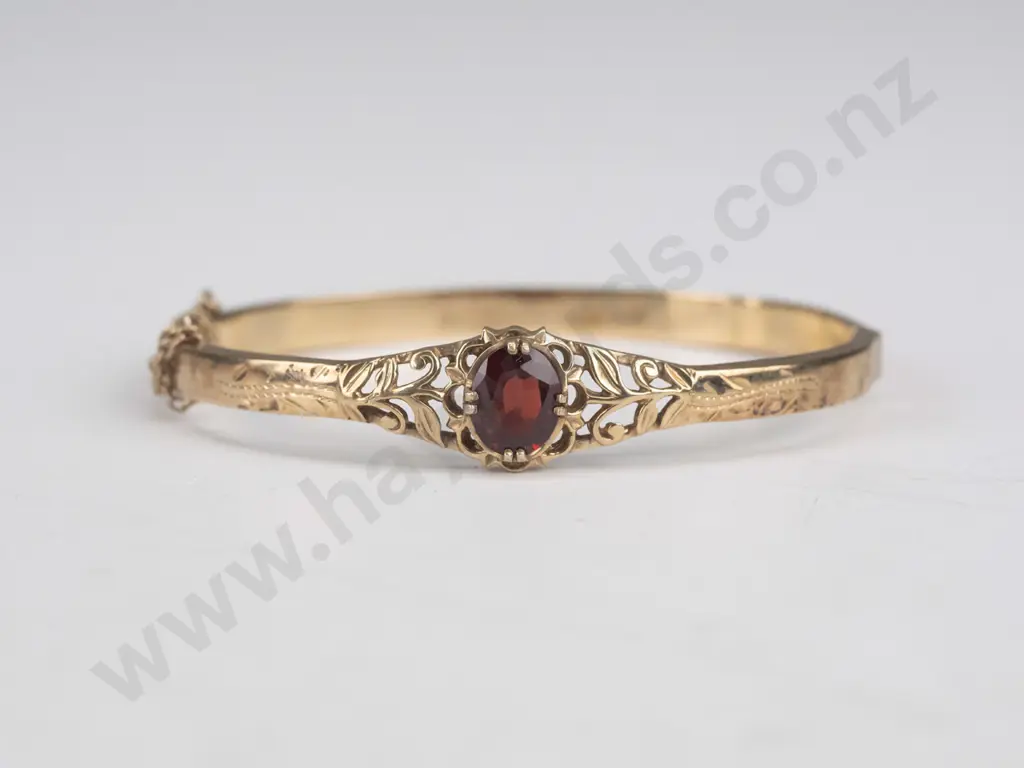 silver bracelet with garnet and safety chain Image 1++