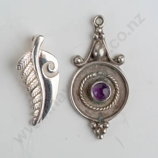 2 silver pendants no chains stamped 925