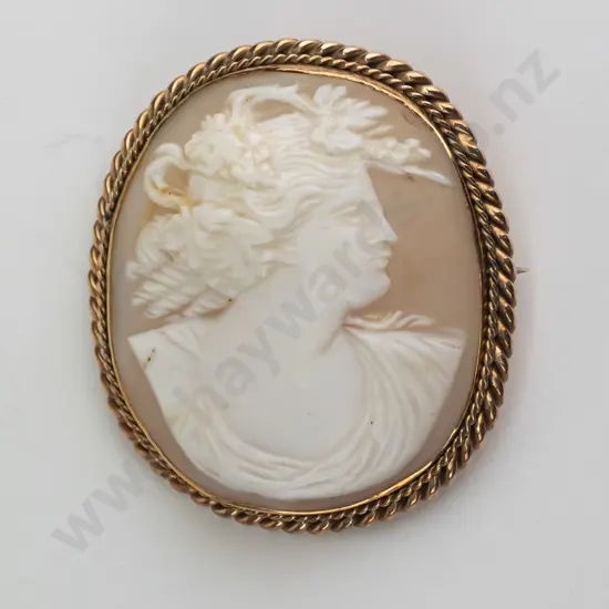 large cameo brooch has bail for a chain