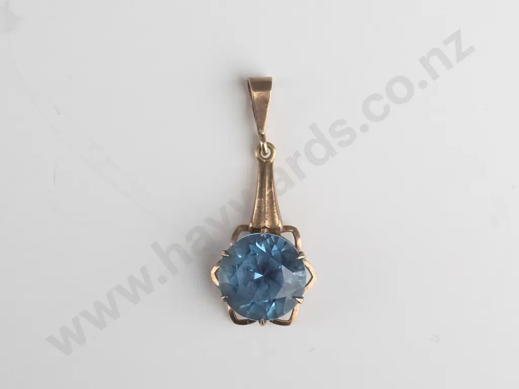 9ct gold drop pendant set with pale blue 11.00 mm round stone 2.2grms Image 1++