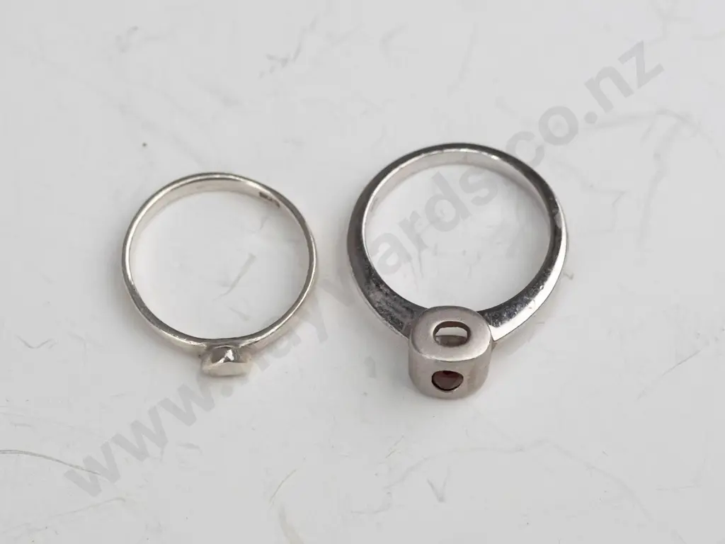 silver ring with small red stone & small silver ring with a heart, both stamped 925 Image 1++