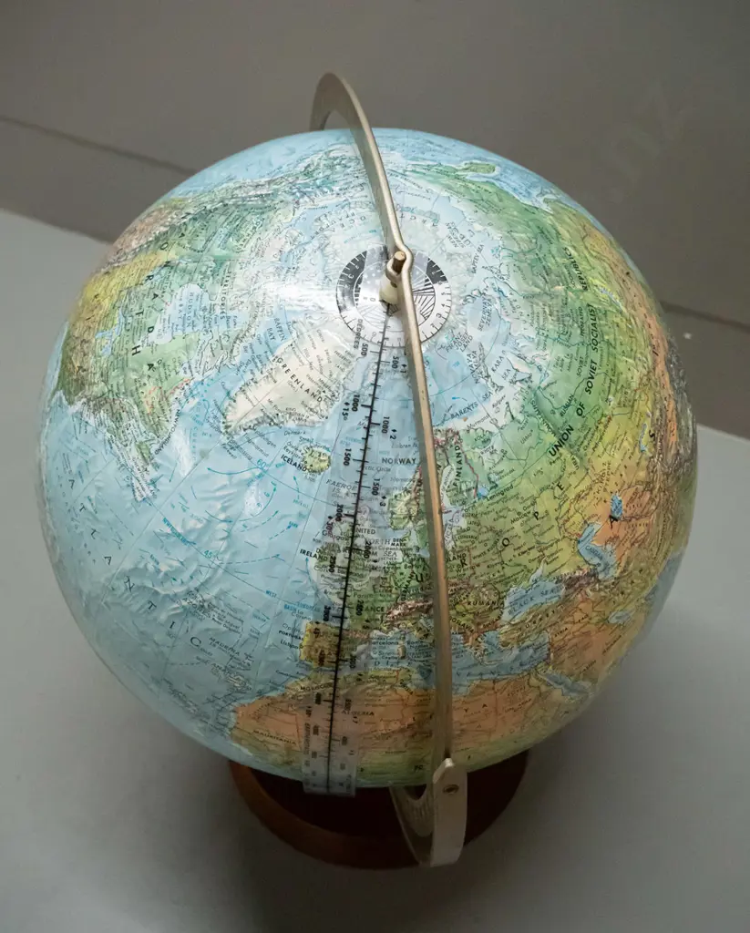 Reader's Digest world globe on timber base with metal frame H410 D290 & Replogl small moon globe loose on plastic stand Image 1++