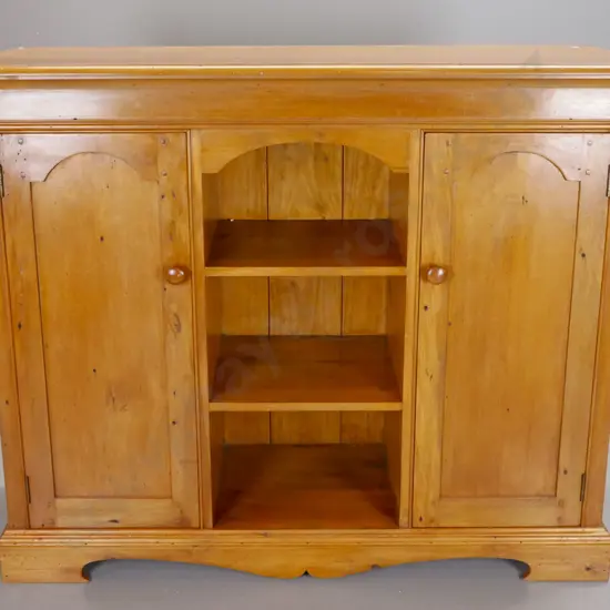 colonial style recycled rimu cupboard, 2 panelled doors with timber knobs, 2 shelves, open shelf gallery with arched top
