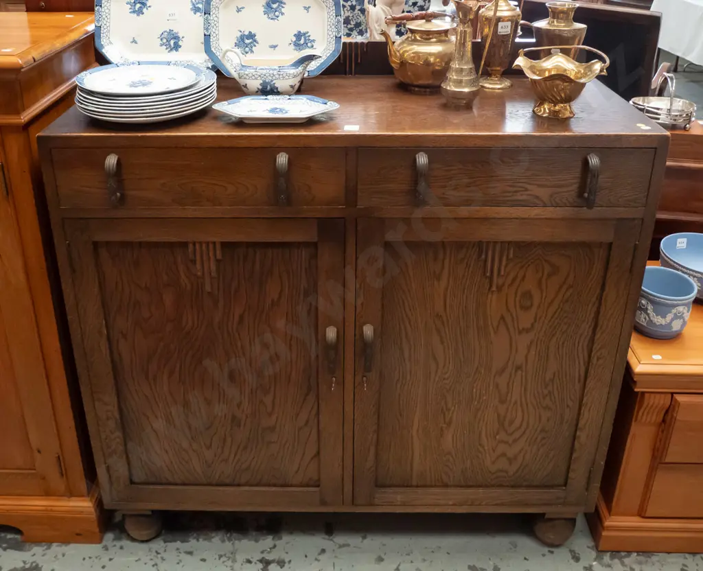 art deco oak sideboard with upstand, 2 drawers and 2 panelled doors, applied wooden decoration, metal handles, on large Image 1++