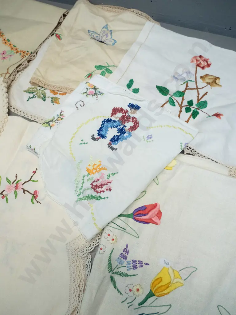 assorted hand-embroidered table linen including table cloths, mats, tray cloths etc. - mostly Dutch and floral motifs Image 1++