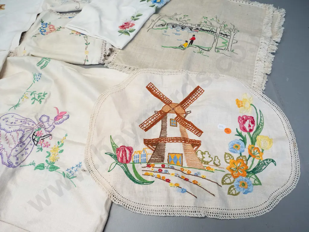 assorted hand-embroidered table linen including table cloths, mats, tray cloths etc. - mostly Dutch and floral motifs Image 1++