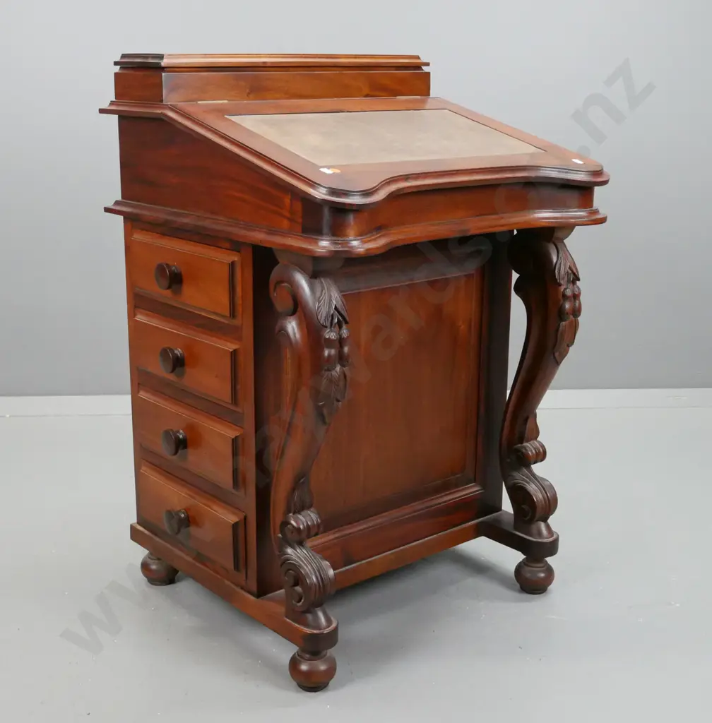 reproduction mahogany Davenport desk with lidded top compartment, leather insert on lift up lid, 8 interior drawers, 4 Image 1++