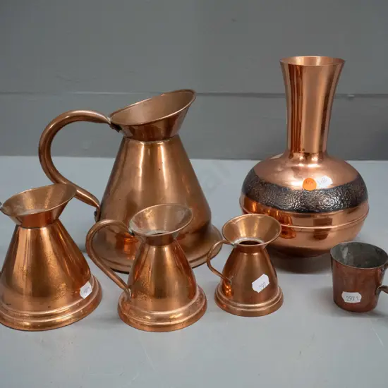 6 copper items: Cobra New Zealand vase with beaten band decoration H-205, graduated set of 4 jugs, large one with dent