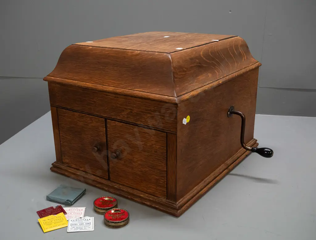 vintage HMV oak-cased wind-up gramophone with Bristol Piano Co. label, 2 tins and sample paper packets of needles, and a Image 1++