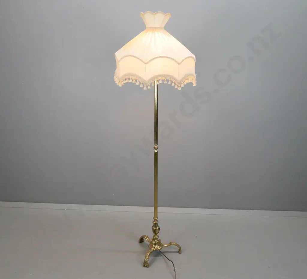 brass standard lamp on 3 shaped foliate feet with waisted fringed shade H-1680 Shade D-510 Image 1++