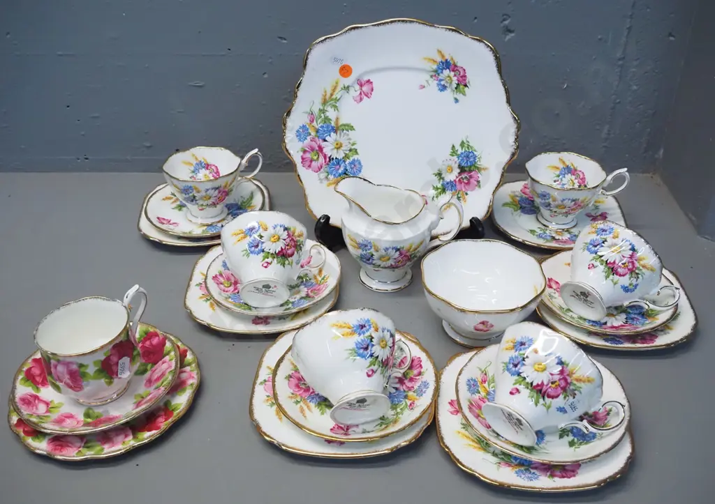 Royal Albert "Harvest Bouquet" 21-piece tea set minus a missing saucer, plus an Old English Rose trio Image 1++
