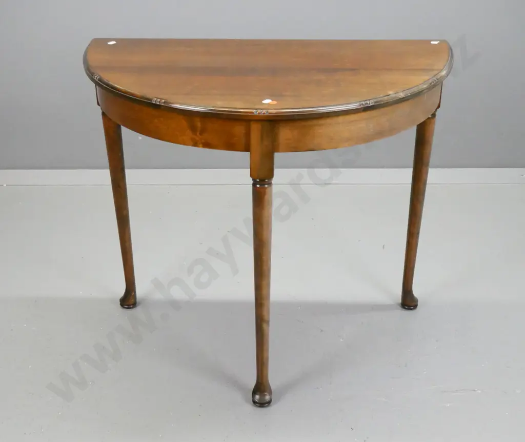 vintage half round beech hall table with 3 round tapered legs on pad feet - some water staining on top, fading to base Image 1++
