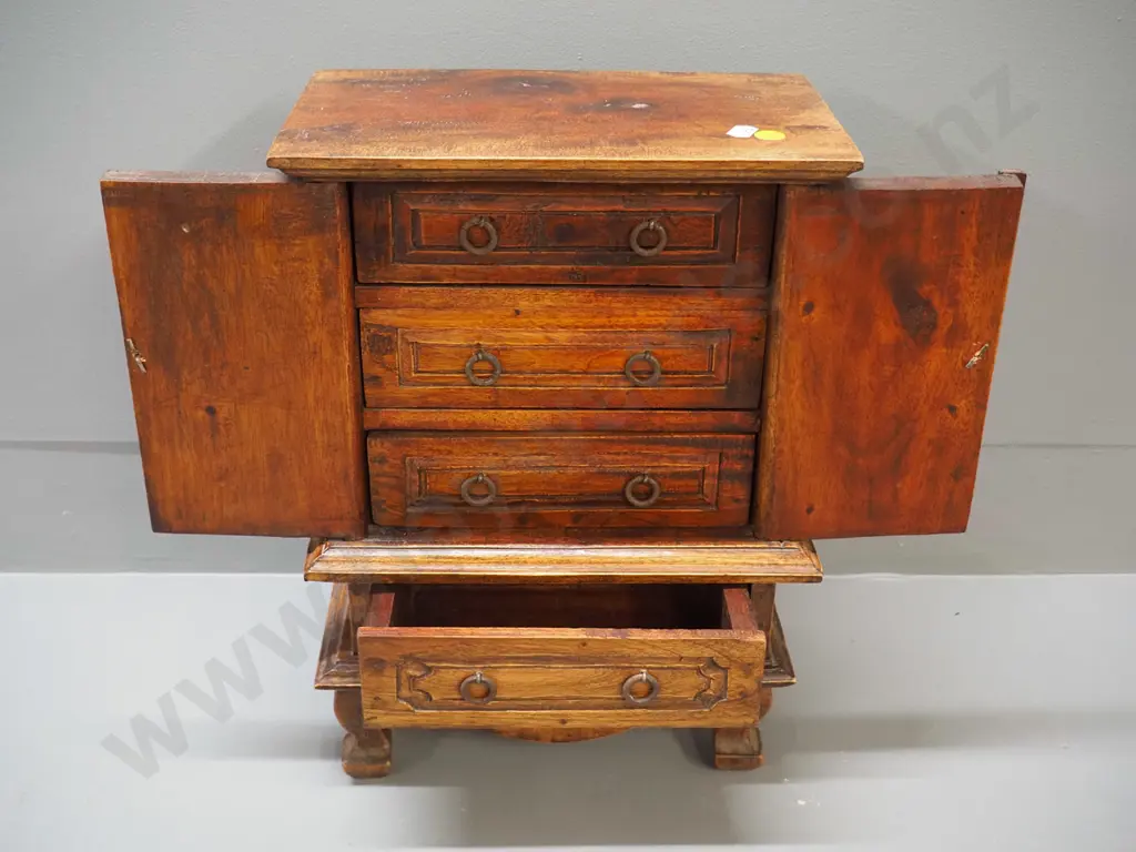 small asian hardwood cabinet with 2 doors, 3 internal and 1 exterior drawer - corrosion to metal ring handles, fading to Image 1++