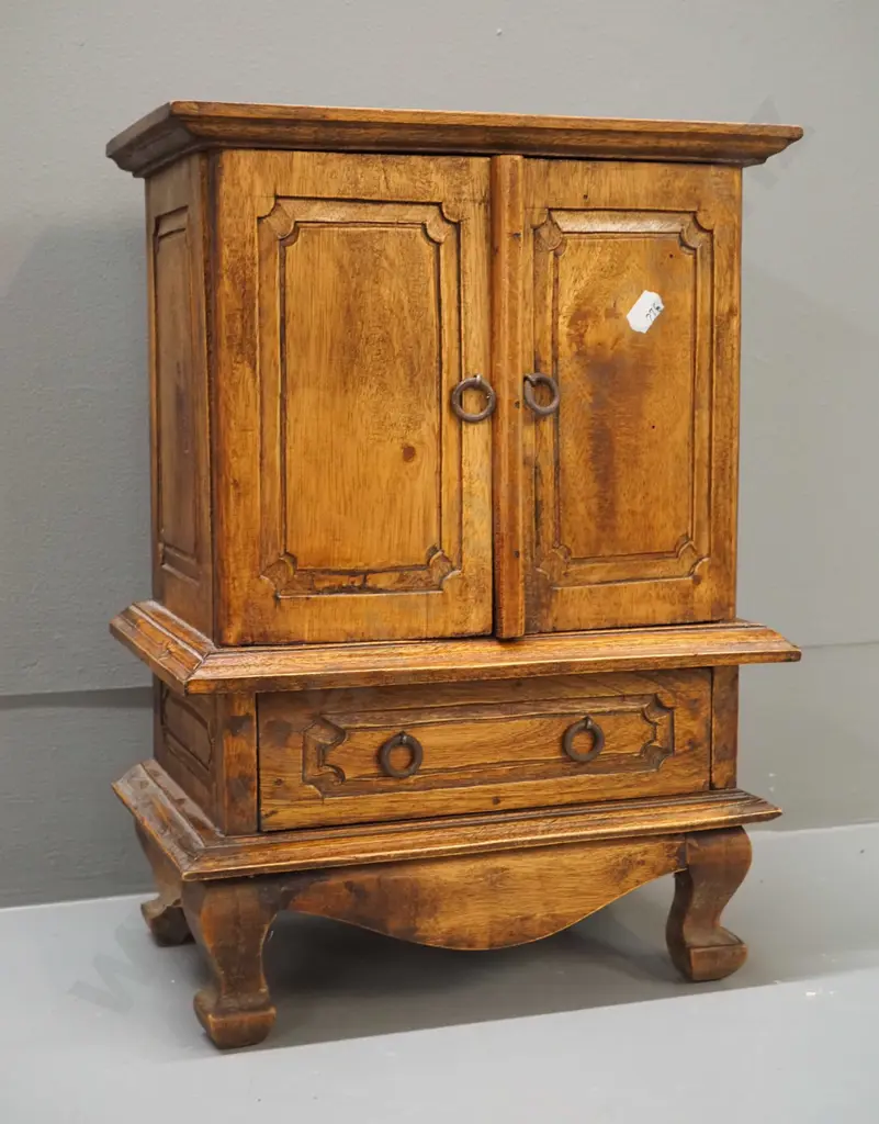 small asian hardwood cabinet with 2 doors, 3 internal and 1 exterior drawer - corrosion to metal ring handles, fading to Image 1++